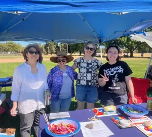 Portland JACL volunteers tabling at the Tiger Tiger 2023 event at Fernhill Park